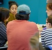 Scholars at table