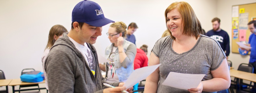 Students in class with paper