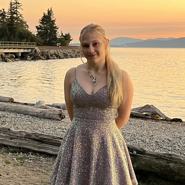 Portrait of Samantha Shein in front of the ocean