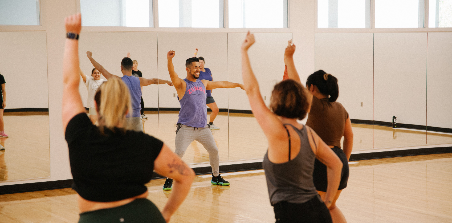 Zumba instructor teaching students