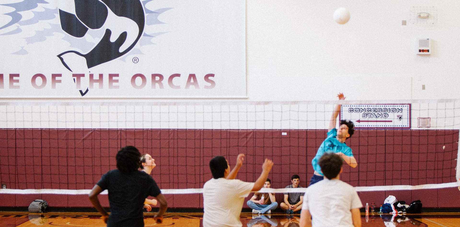 Students playing volleyball