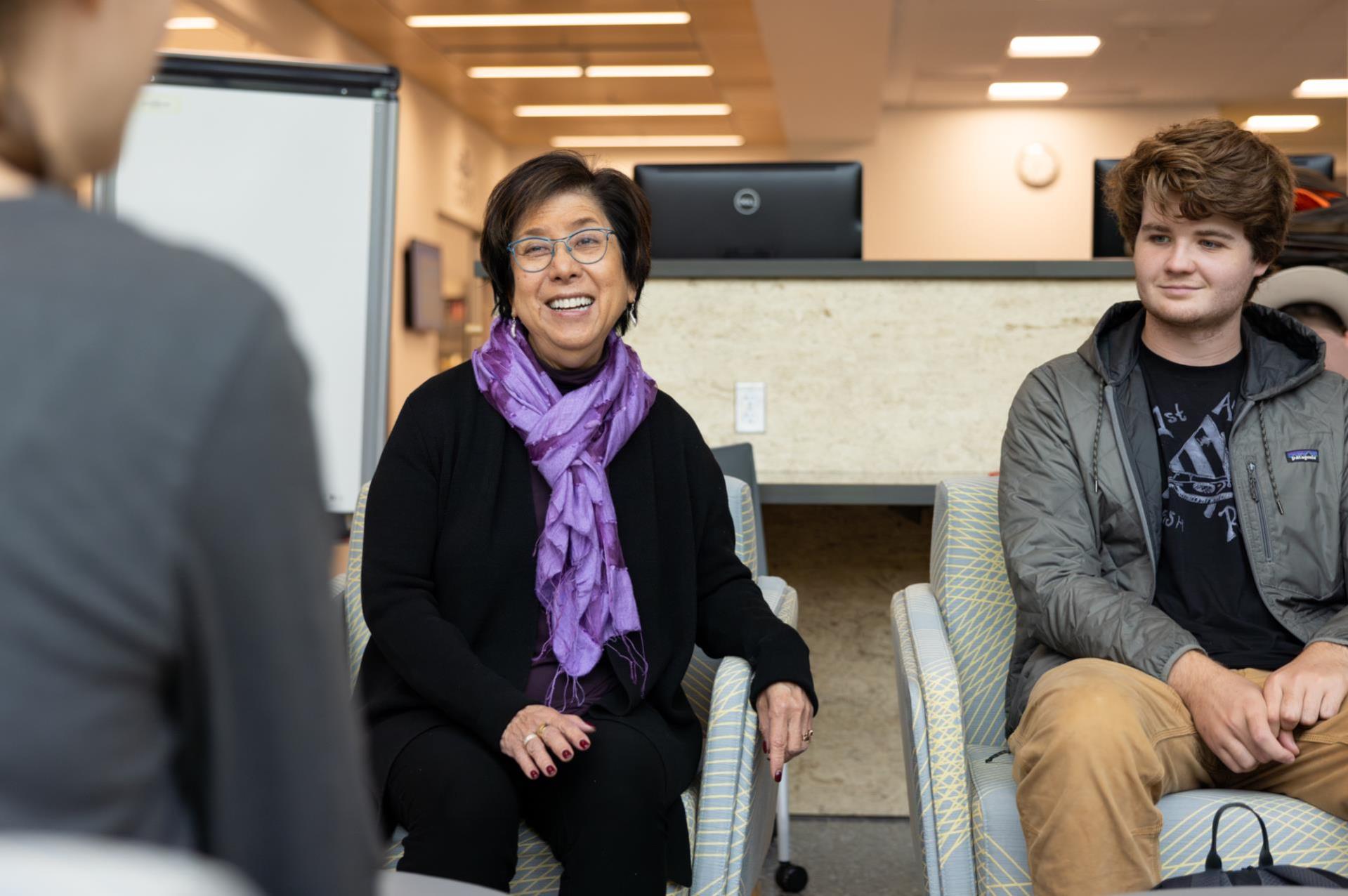 Cascadia News Article Photo of President Kathi Hyani-Brown with a student