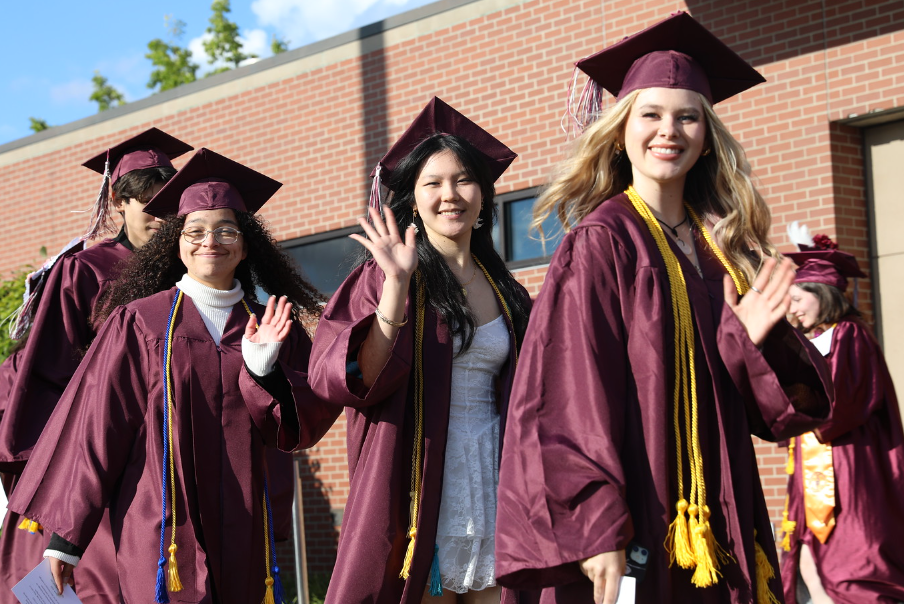 Waving graduates